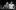 A Streetcar Named Desire A white woman with short blonde hair in a dress stands next to a white man in a white T-shirt, both are smoking.