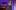 His Eye is on the Sparrow 1 A woman with cropped hair and darker skin in an ornate purple and black coat sings into a microphone while holding a large feathered fan. To the left, a white man sits playing the piano.